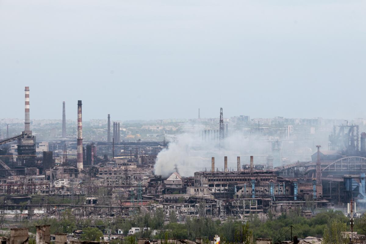 Smoke rises from a steel plant in Mariupol 