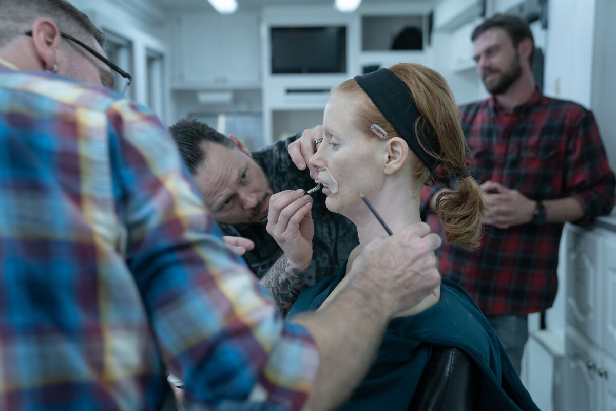 Actress Jessica Chastain's transformation by the hair and make-up and prosthetics team into Tammy Faye Bakker