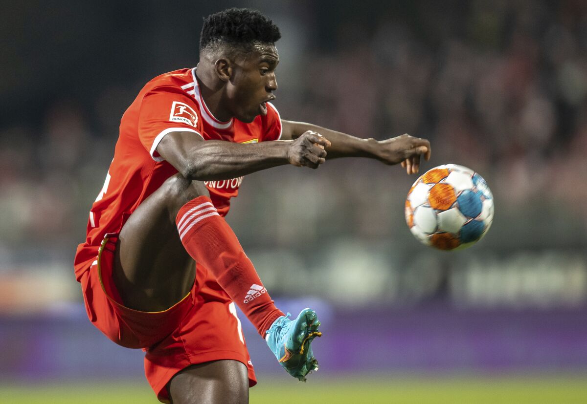 Union Berlin's Taiwo Awoniyi controls the ball, during the German Bundesliga soccer match between Union Berlin and Cologne, in Berlin, Friday, April 1, 2022. (Andreas Gora/dpa via AP)