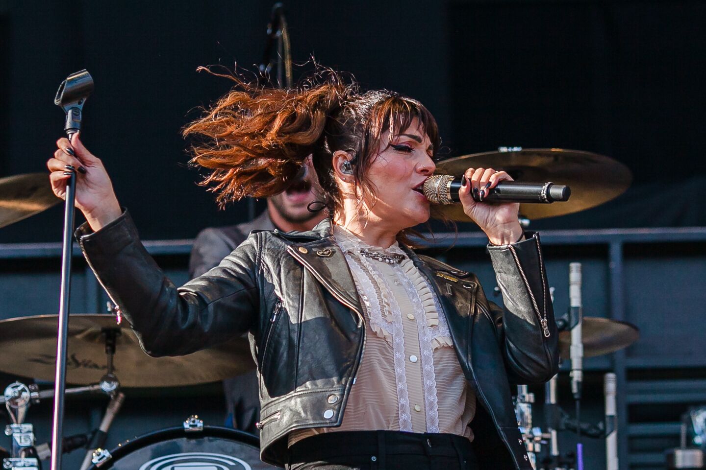 Aimee Allen from The Interrupters sings at Petco Park during the Hella Mega Tour in downtown San Diego on August 29, 2021.