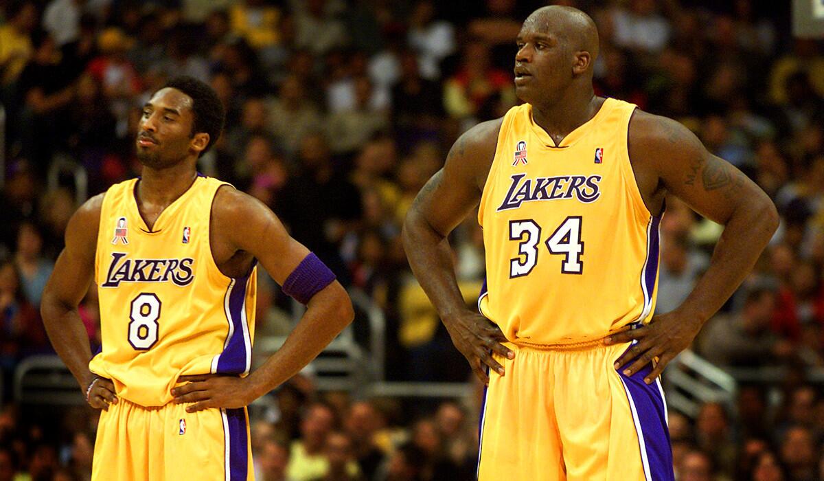 Los Angeles Lakers' Kobe Bryant and Shaquille O'Neal during a game against the Indiana Pacers at Staples Center on March 1, 2002.