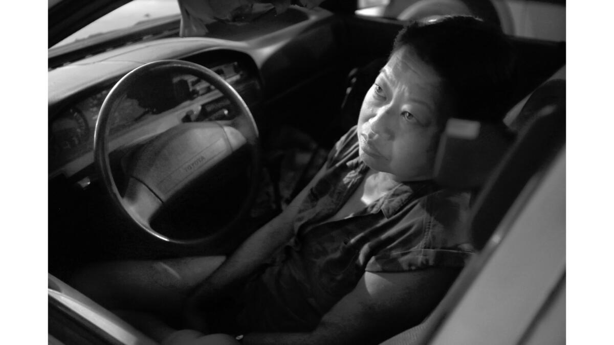 Meg Shimatsu, 54, spends her nights in her car parked outside the hospital where she gets dialysis treatment.