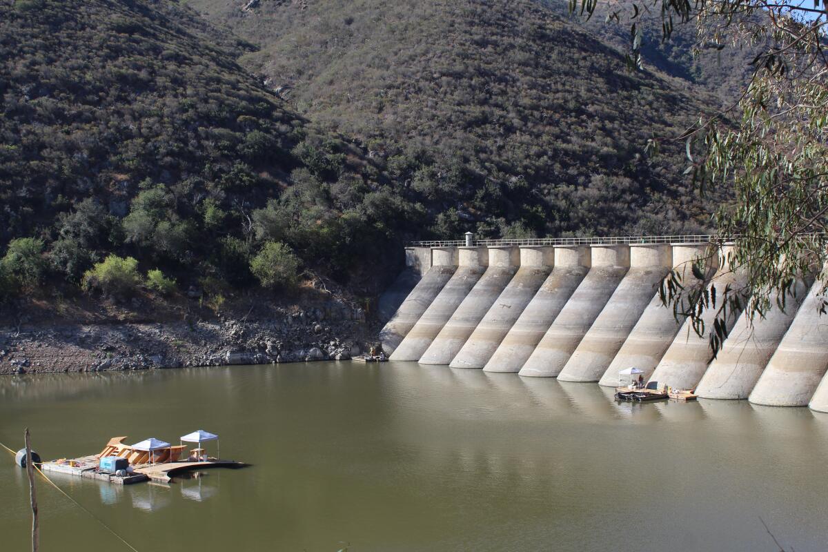 Repair work continues on Lake Hodges Dam.