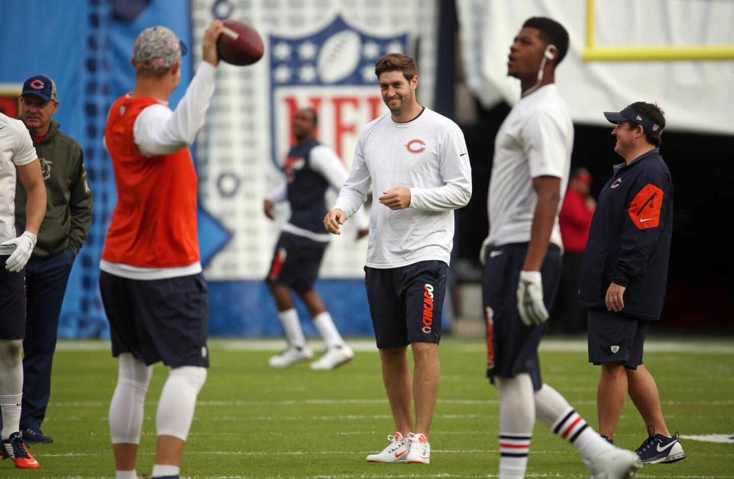 Bears quarterback Jay Cutler warms up with teammates at Qualcomm Stadium.