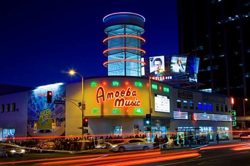 The AIDS Healthcare Foundation is part of a push to block construction of a 26-story tower on the Amoeba Music site.