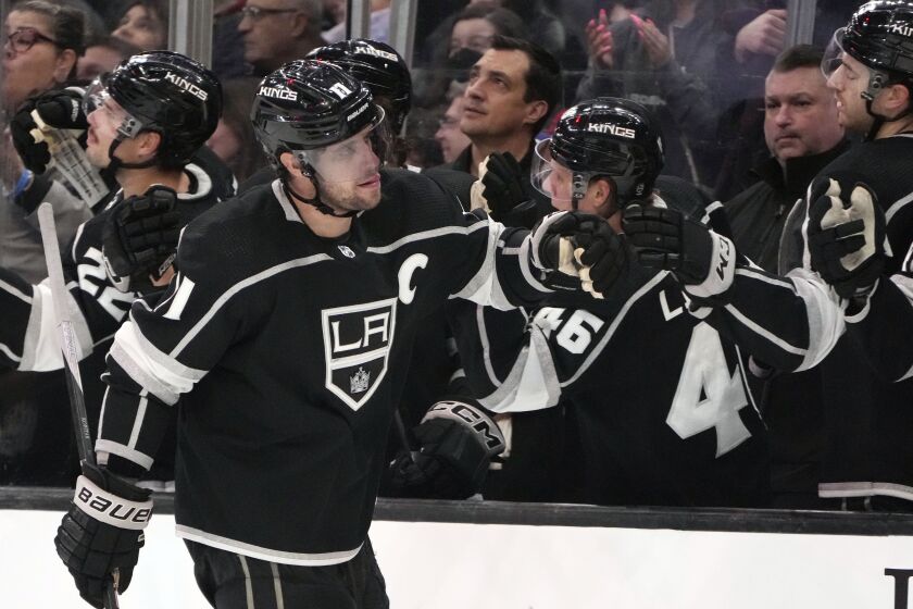 Los Angeles Kings center Anze Kopitar, left, celebrates his goal against the Montreal Canadiens.