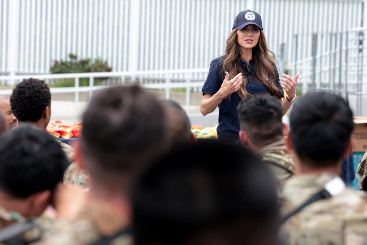 Commentary: In an L.A. park, Trump unleashed his latest show of farce: The Battle of the Photo Op Commentary: In an L.A. park, Trump unleashed his latest show of farce: The Battle of the Photo Op