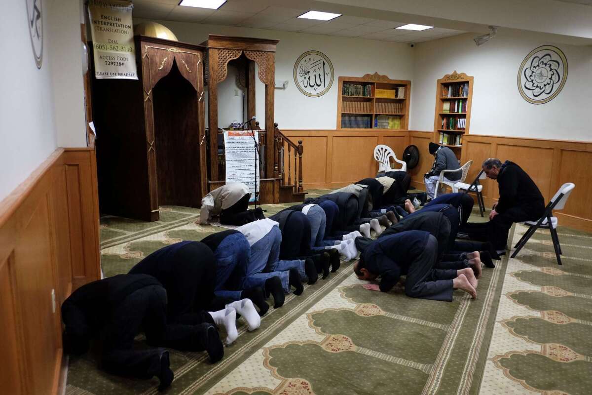 Men pray at a mosque in Jersey City, N.J.