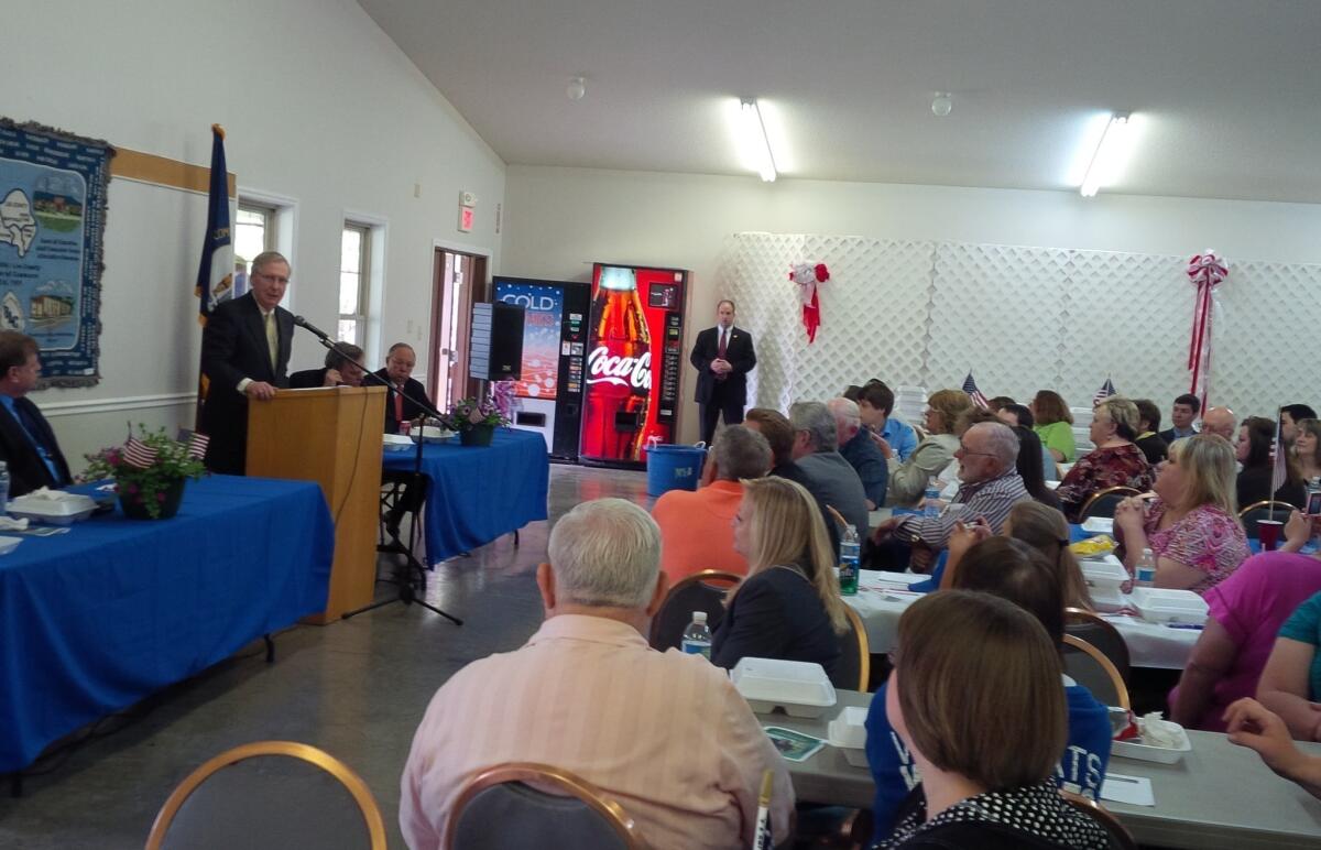 Senate Republican Leader Mitch McConnell speaks at a luncheon at the Happy Top Community Center in Beattyville, Ky.
