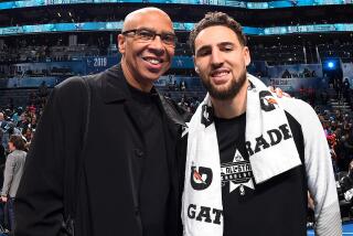 Mychal Thompson, left, and son Klay Thompson pose at the 2019 NBA All-Star Game