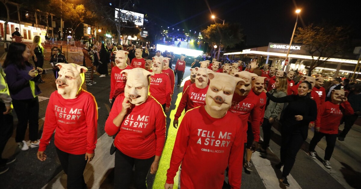 Thousands descend on West Hollywood for Halloween party Los Angeles Times