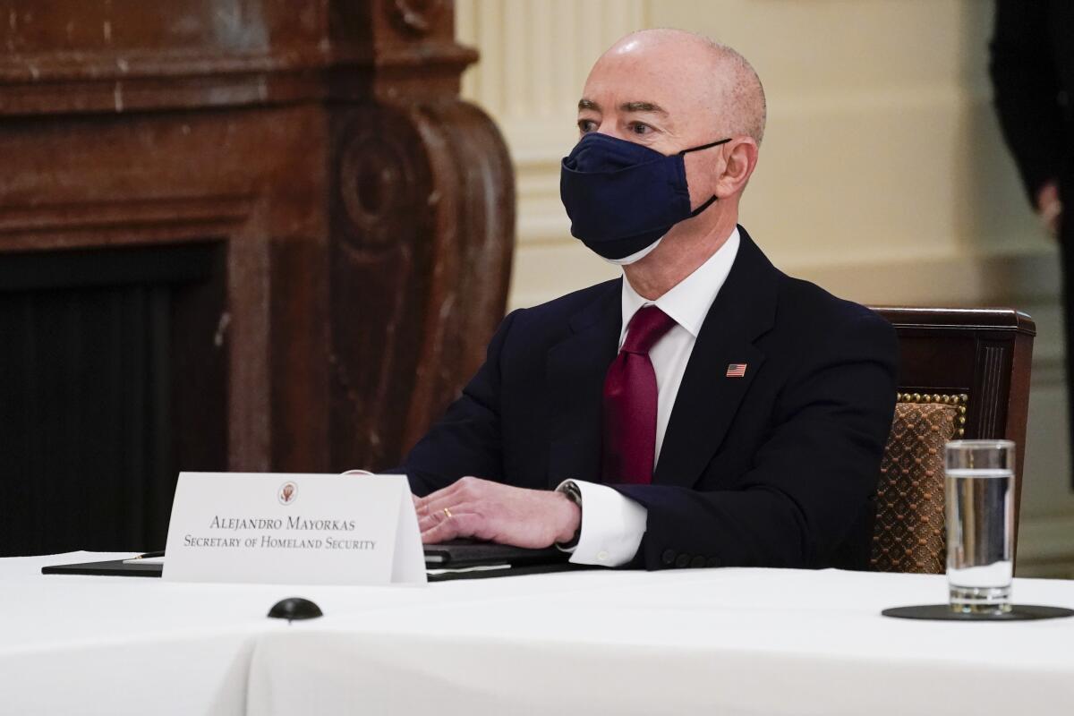 Alejandro Mayorkas attends a Cabinet meeting 