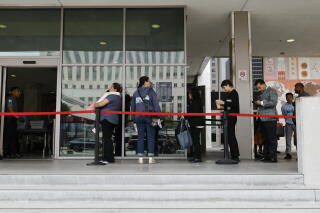 People line up outside the North Los Angeles Street Immigration Court