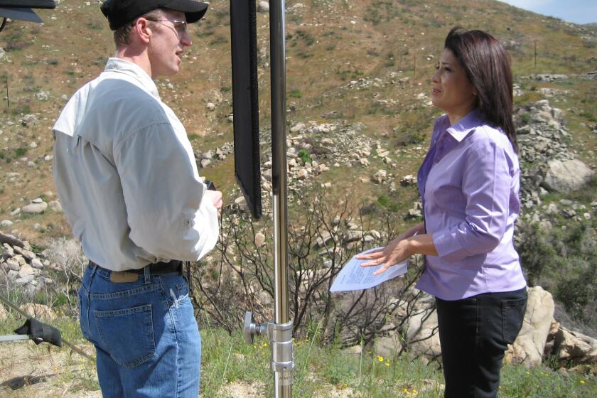 Laura Castaneda and Matt Alioto on location in East County in 2008 while shooting a documentary "The Devil's Breath" for UCSD-TV.