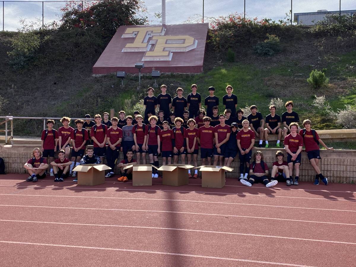 The Torrey Pines boys soccer teams recently supported Feeding San Diego.