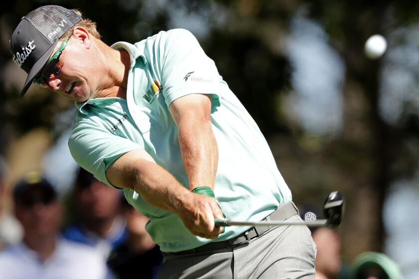 Charley Hoffman hits his tee shot at No. 4 during the third round of the Masters tournament.