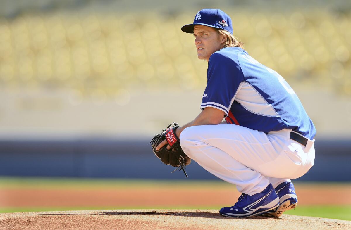 Dodgers pitcher Zack Greinke takes the mound during a practice at Dodger Stadium on Oct. 7.