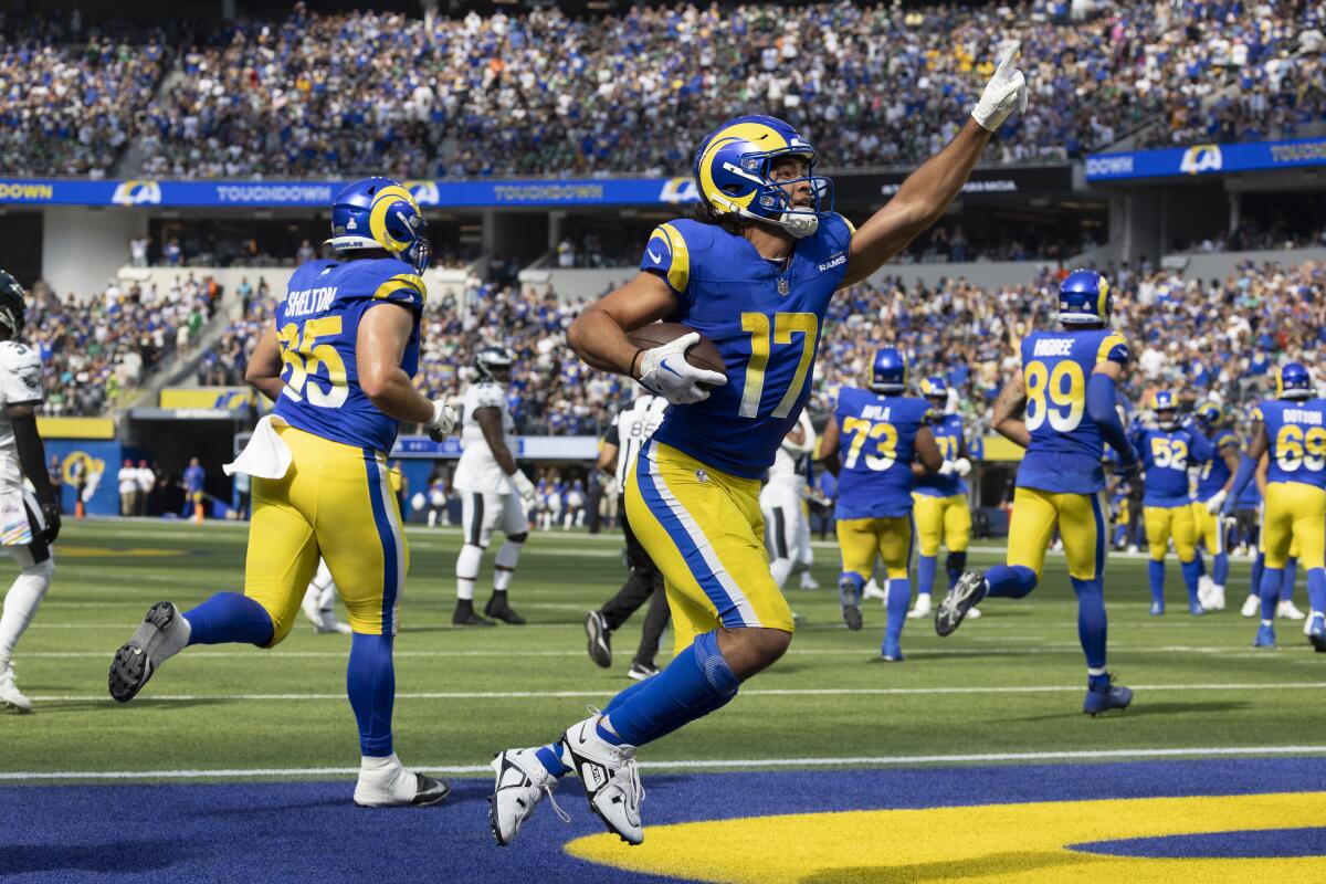 Rams wide receiver Puka Nacua celebrates his touchdown catch against the Eagles.