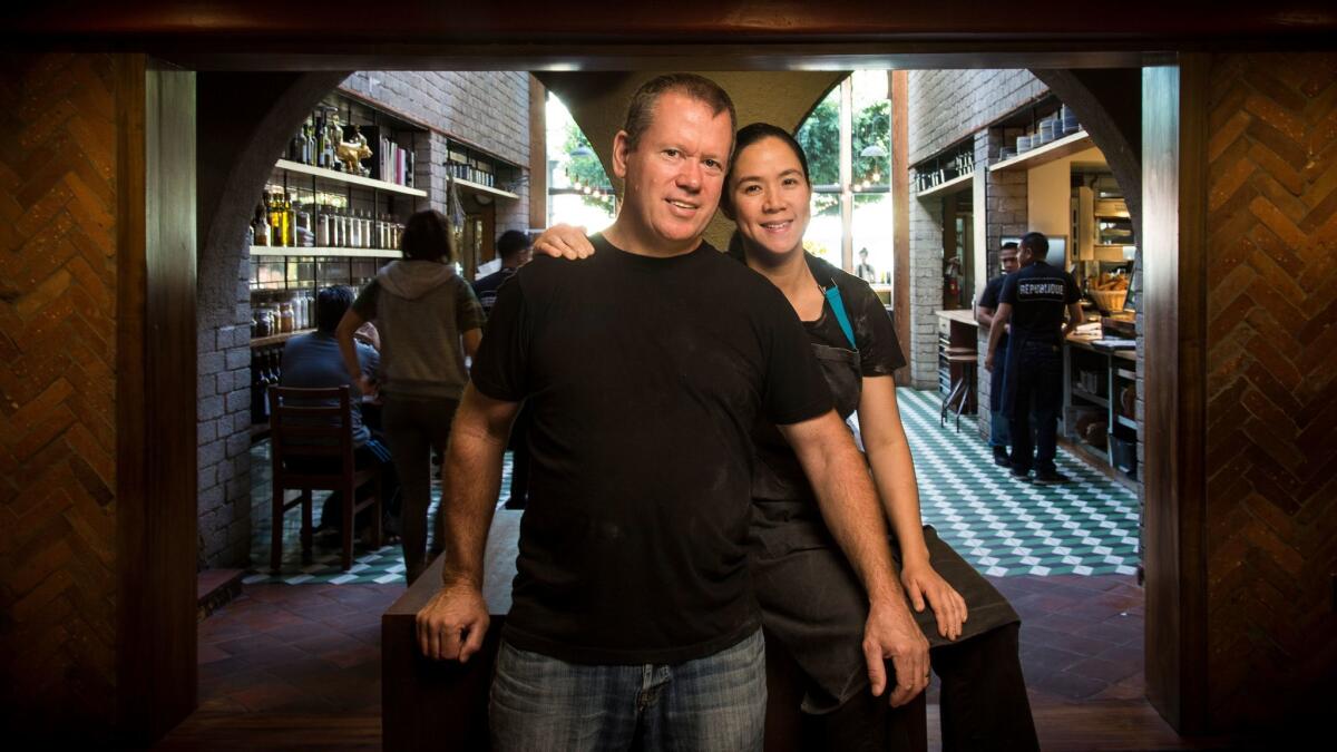 Husband and wife chefs Walter and Margarita Manzke, seen at their République restaurant, plan to open a Filipino food stall at Grand Central Market.