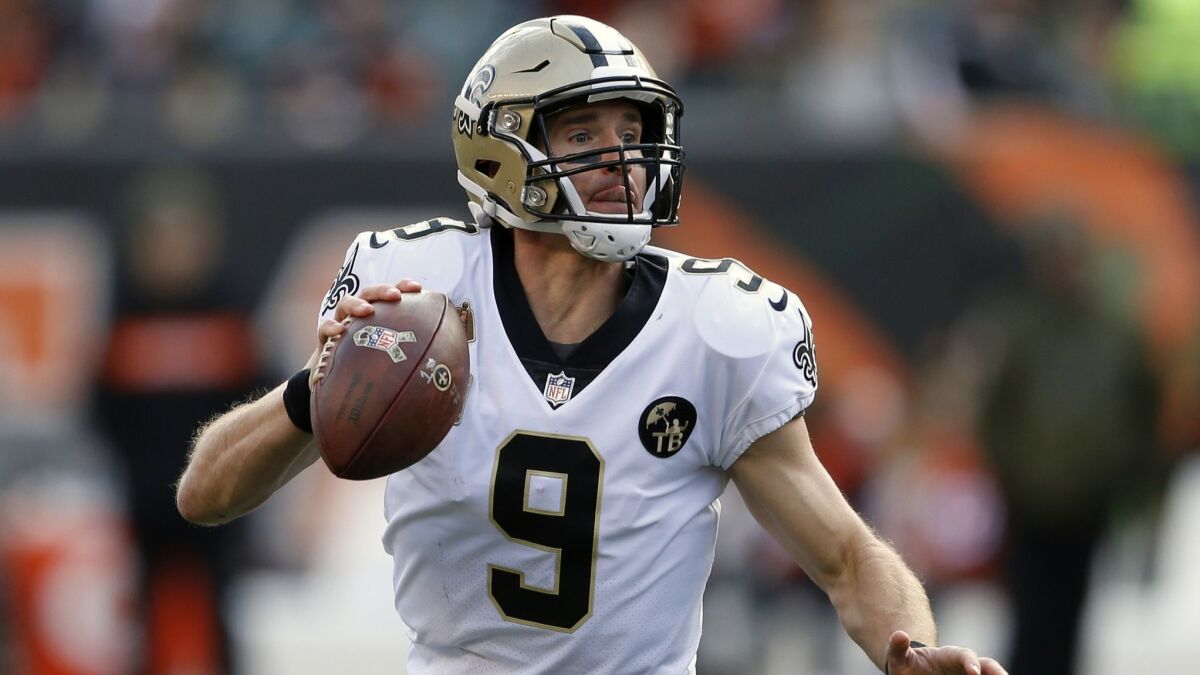 Saints quarterback Drew Brees will lead his team into the playoffs next weekend.