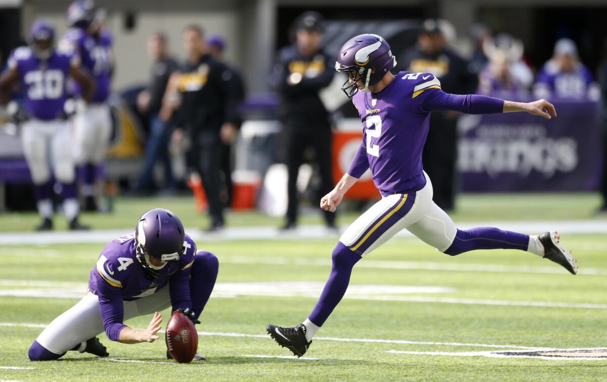 Minnesota Vikings kicker Kai Forbath kicks a 52-yard field goal during the first half against the Baltimore Ravens.