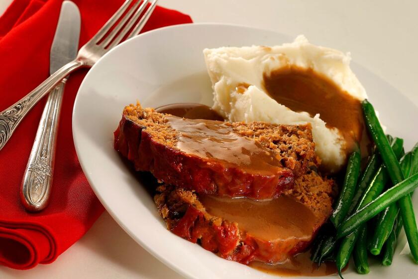 101 Coffee Shop meatloaf with mashed potatoes, gravy, and green beans.