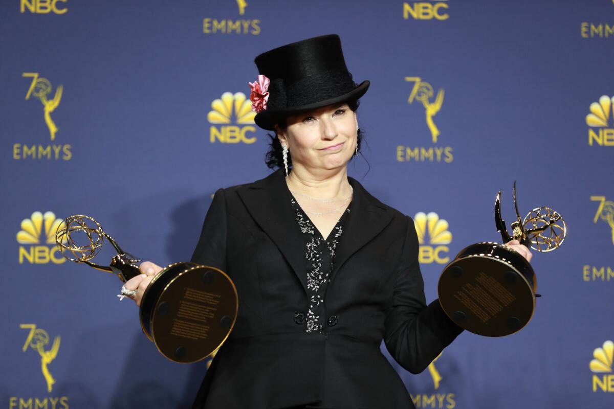 Creator Amy Sherman-Palladino holds Emmy Awards for writing and directing, before her show took home the prize for comedy series.