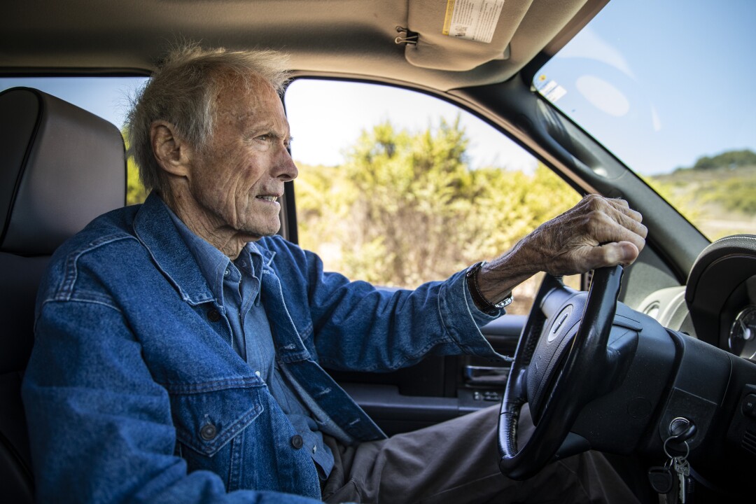 Clint Eastwood driving his truck.