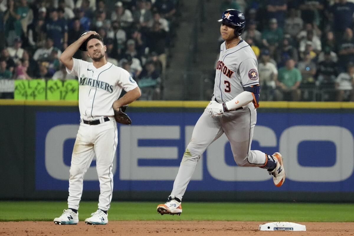 The Astros' Jeremy Pena rounds the bases after hitting an 18th-inning home run against the Mariners on Oct. 15, 2022.