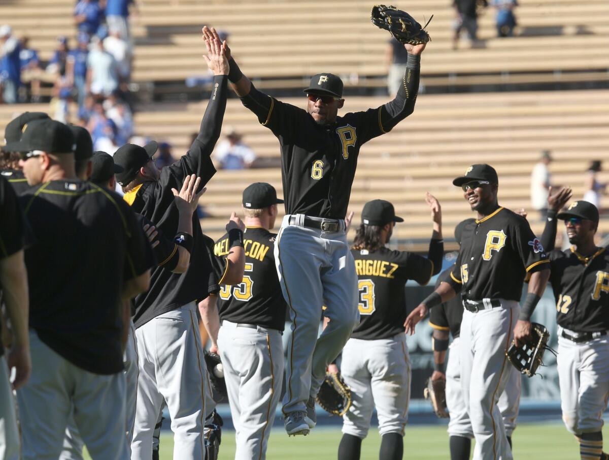 The Pirates celebrate after winning two of three from the Dodgers.