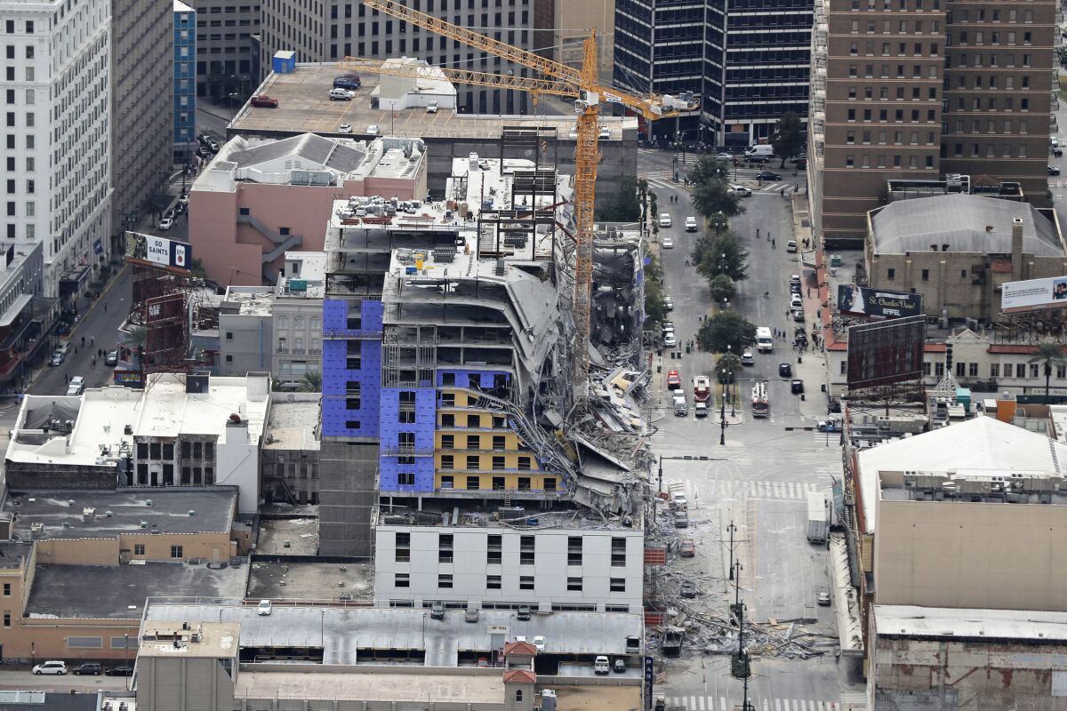 FILE - This Oct. 12, 2019, file aerial photo shows the Hard Rock Hotel, which was under construction, after a fatal partial collapse in New Orleans. Crews on Saturday, Aug. 8, 2020, recovered the body of one of two construction workers that had been trapped in the collapse nearly 10 months ago of a Hard Rock Hotel under construction in New Orleans. (AP Photo/Gerald Herbert, File)