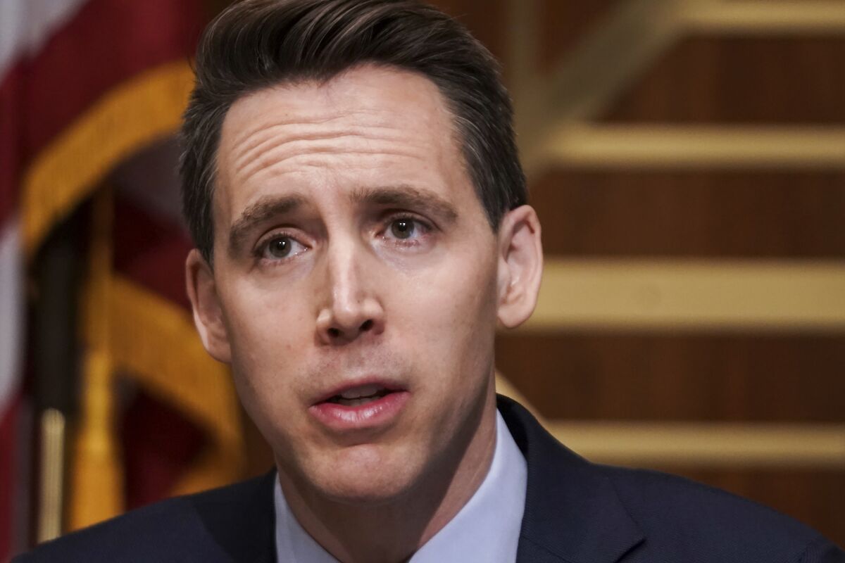 Sen. Josh Hawley, R-Mo., asks questions during a Senate Homeland Security & Governmental Affairs Committee hearing to discuss election security and the 2020 election process on Wednesday, Dec. 16, 2020, on Capitol Hill in Washington. (Greg Nash/Pool via AP)