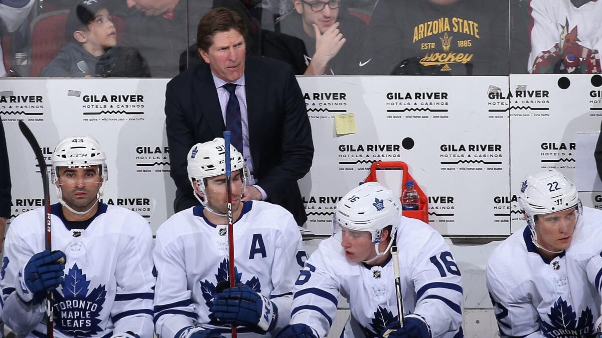 Maple Leafs head coach Mike Babcock watches from the bench during a game against the Arizona Coyotes in February.