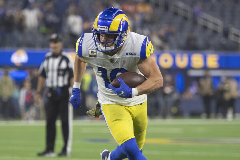 Los Angeles Rams wide receiver Cooper Kupp (10) runs with the ball.