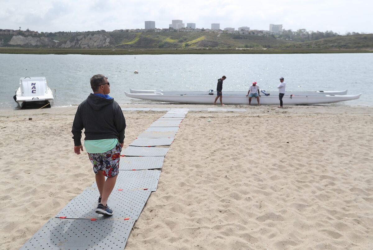 Creighton Wall prepares to head out for an outrigger paddle session at Project Independence's Access to Adventure program.