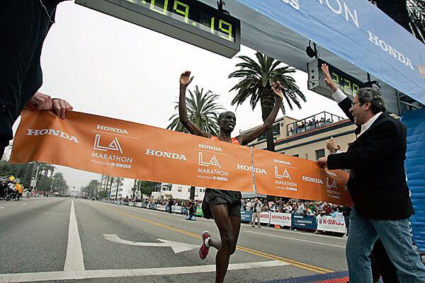 Wesley Korir of Kenya crosses the finish line, winning the 2010 Los Angeles Marathon on Sunday. Korir was the defending champion.