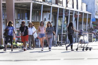 Shoppers at the Little Saigon market Sieu Thi ABC Supermarket in Westmister.