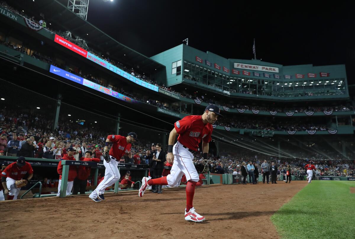 The Boston Red Sox take the field at Fenway Park on Oct. 6, 2018.