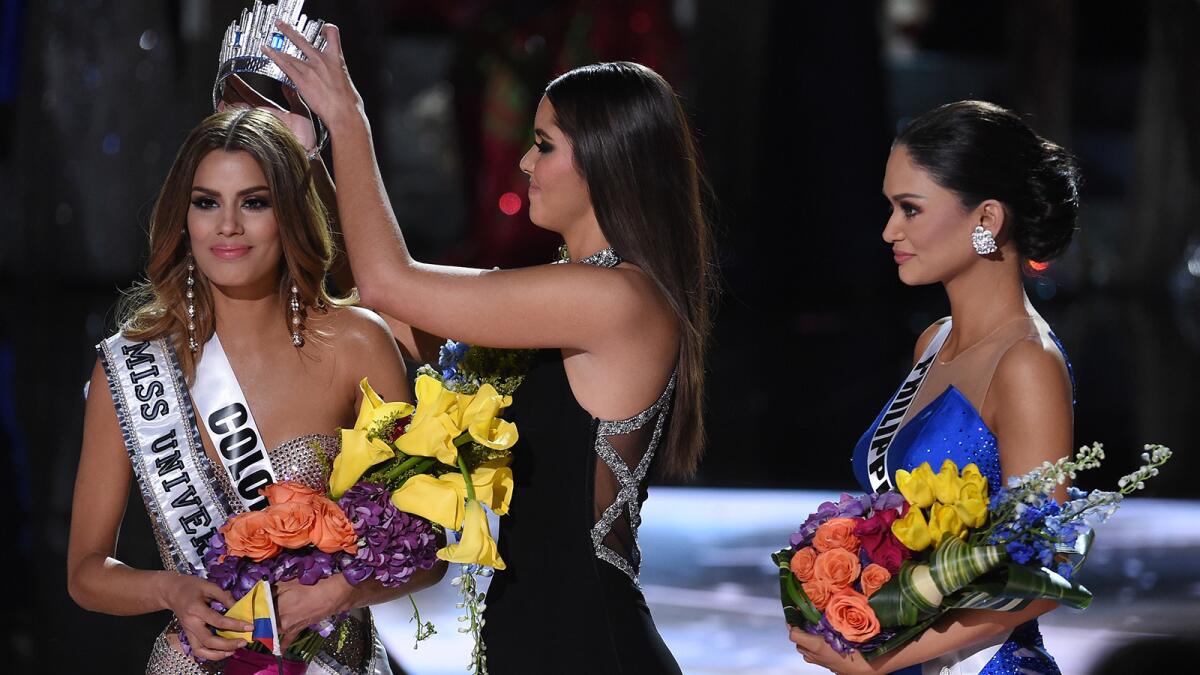 Pia Alonzo Wurtzbach, right, discusses an awkward momen from the Miss Universe Pageant on "Steve Harvey." Also pictured Ariadna Gutierrez Miss Columbia, left, and Paulina Vega.