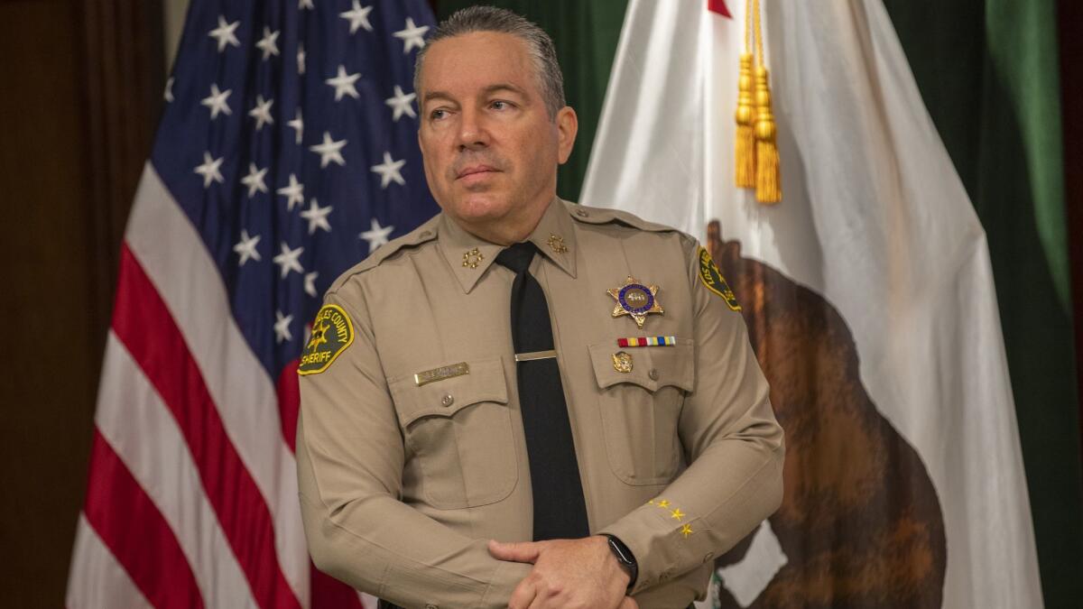 L.A. County Sheriff Alex Villanueva waits to speak during a media open house at the Hall of Justice in 2019.