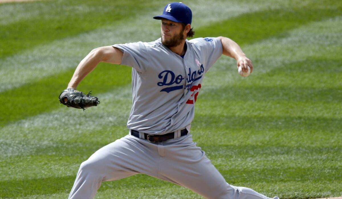 Dodgers starter Clayton Kershaw delivers a pitch against the Rockies in the bottom of the fourth inning Sunday in Denver.