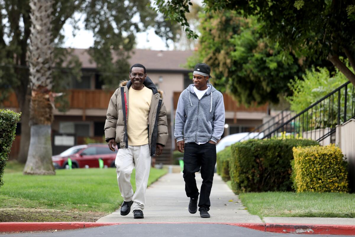 Ren Drake, right, shown with is father, Renwick Drake Sr., in West Sacramento. 