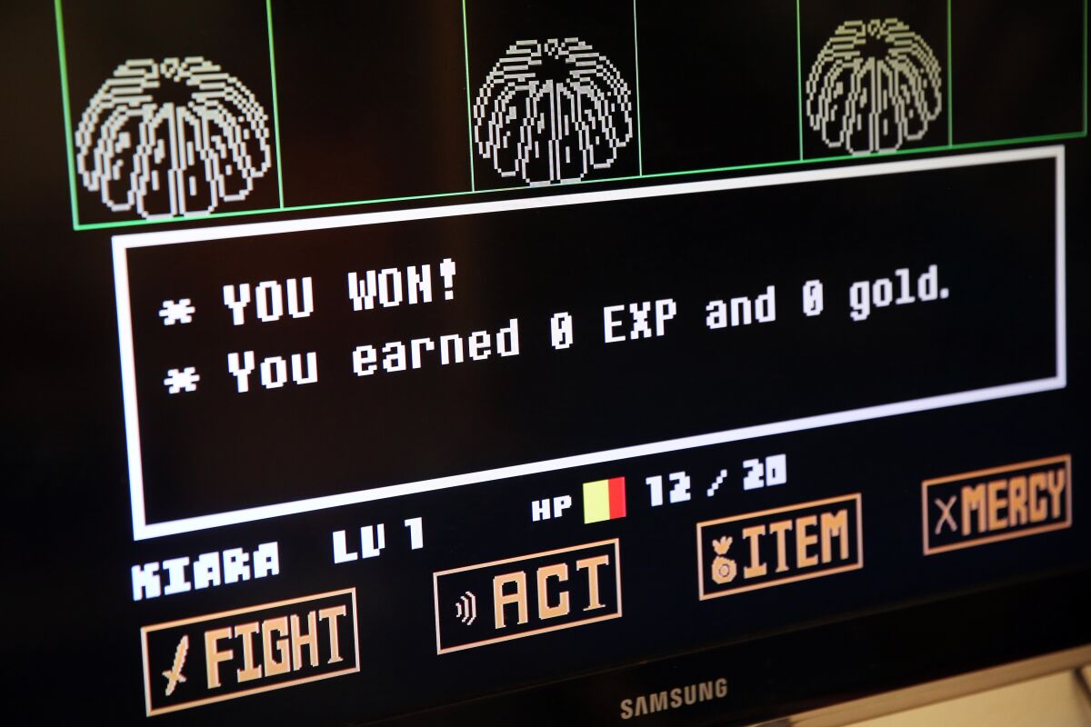A screen with images and words, including "You won!"