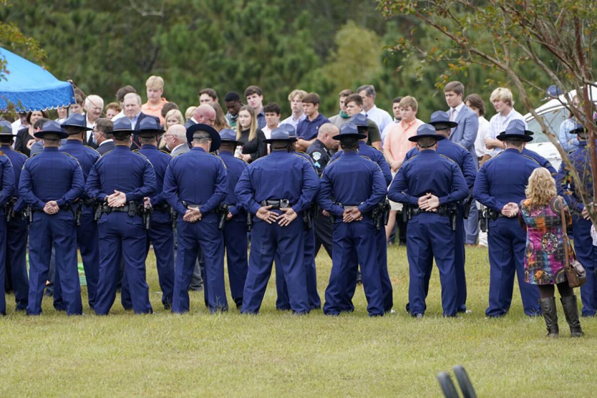 Louisiana state troopers attend funeral services for Master Trooper Chris Hollingsworth in West Monroe, La., on Friday.