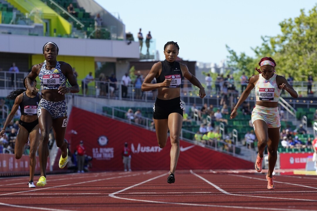 Allyson Felix win the first heat of the women's 400 meters at the U.S. Olympic track and field trials.