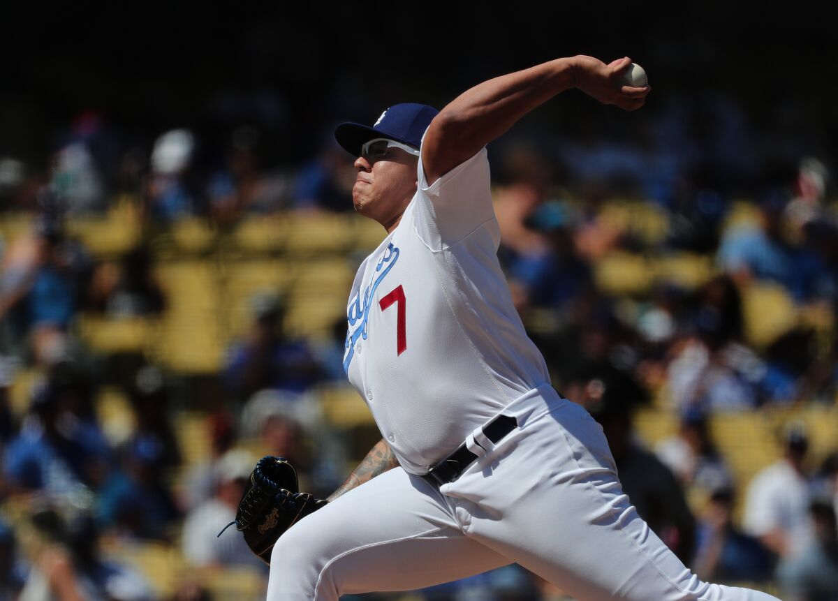 Dodgers starter Julio Urias delivers during Sunday's victory over the San Francisco Giants.