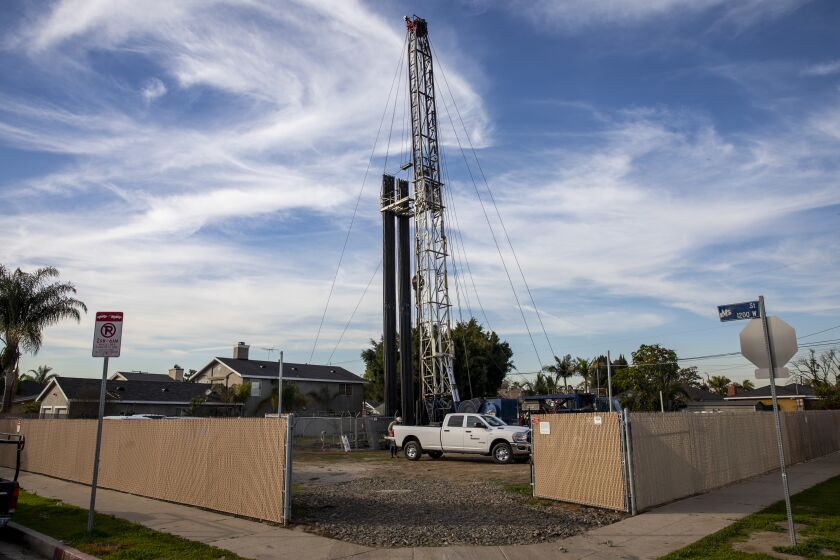 Los Angeles, CA - January 26: An oil derrick found at the corner of W M Street and Frigate Avenue, in the Wilmington neighborhood, of Los Angeles, CA, Wednesday, Jan. 26, 2022. The Los Angeles City Council voted Wednesday to ban new oil and gas wells and to phase out existing wells over a five-year period.(Jay L. Clendenin / Los Angeles Times)