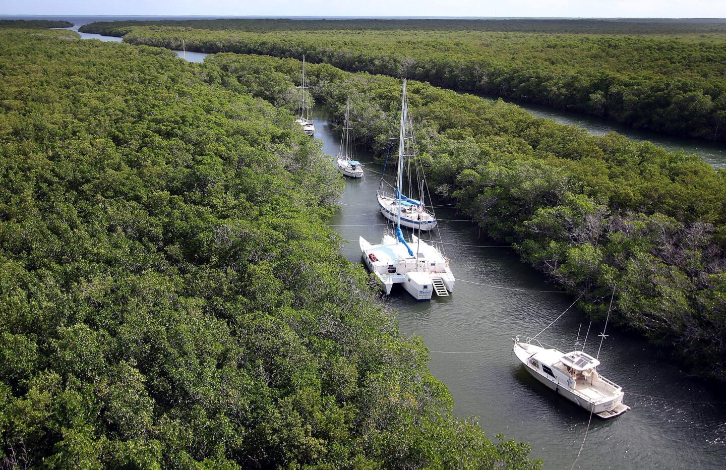 Boats that can't be evacuated are tied off in canals to protect them from Hurricane Irma on in Key Largo, Florida. The entire Florida Keys are under a mandatory evacuation notice as Hurricane Irma approaches the low-lying chain of islands south of Miami.