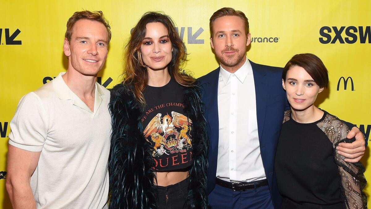 Michael Fassbender, from left, Bernice Marlohe, Ryan Gosling and Rooney Mara at the "Song to Song" premiere on March 10, 2017, in Austin, Texas.