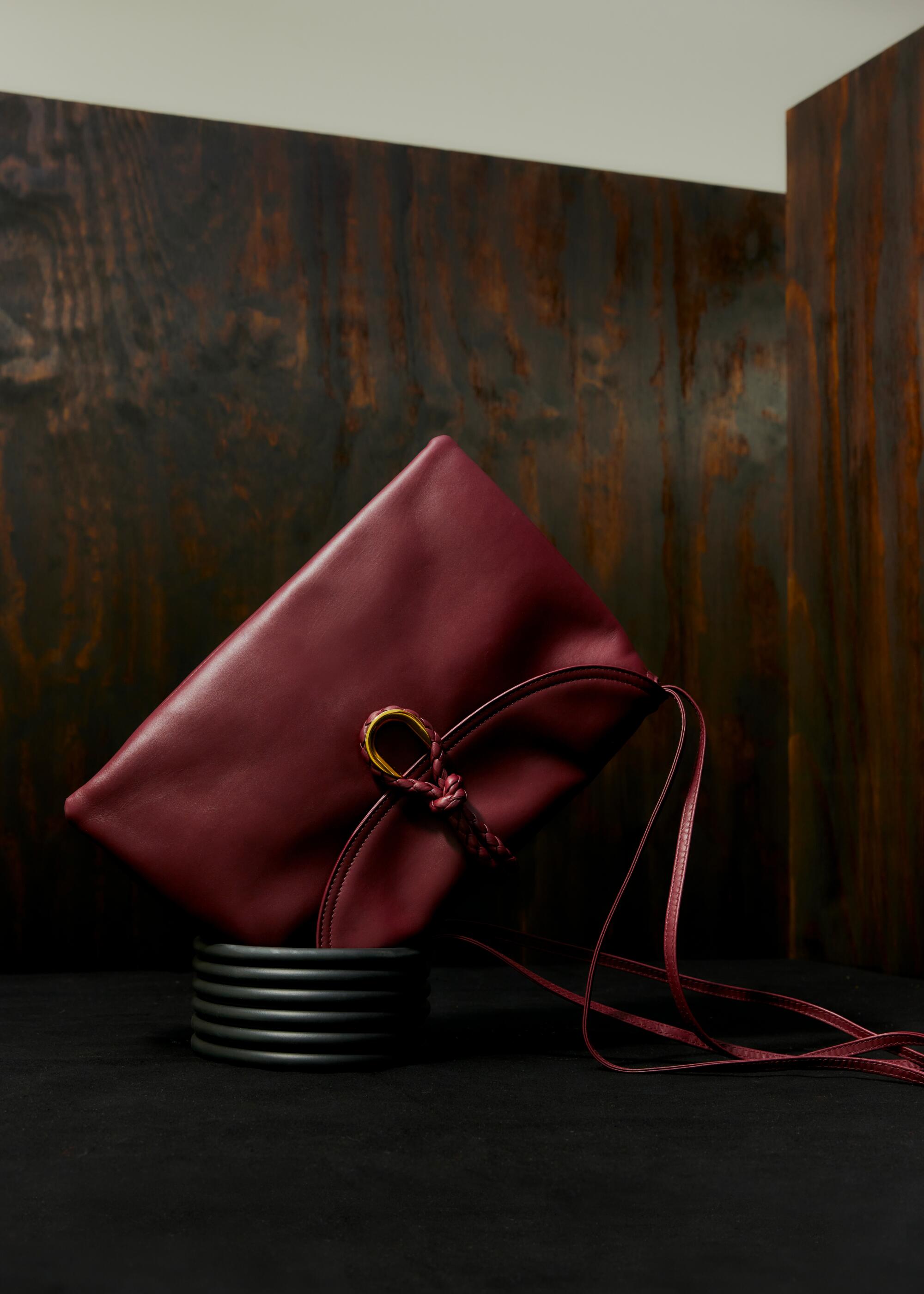 Bottega Veneta Liberta bag in burgundy.